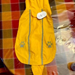Dog raincoat new  for a large smaller dog. Like shihtzu